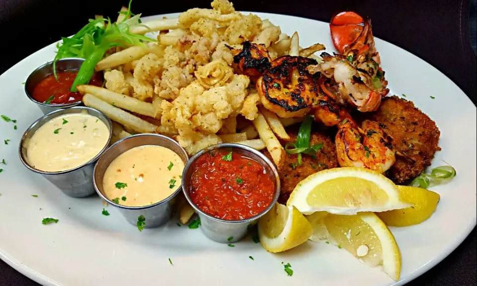 seafood app platter....blackened catfish,guallijo shrimp skewer,salmon croquettes,calimari...|chef Charlesさん