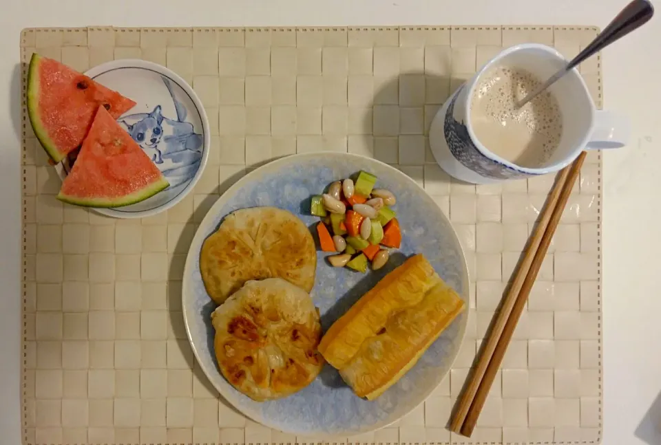 Snapdishの料理写真:Breakfast: pancake, salty peanut with carrot, fried bread stick, watermelon and milktea.|Liciaさん