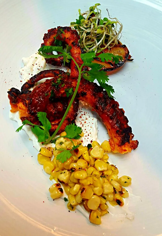 Snapdishの料理写真:charred octopus appetizer....with Greek yogurt and grilled peaches|chef Charlesさん