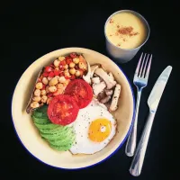 Snapdishの料理写真:Sunday brunch - Baked sweet potato with chickpea-pepper stirfry, sautéed mushrooms, roasted tomato, avocado & 🍳 + cup of spiced goldenmilk