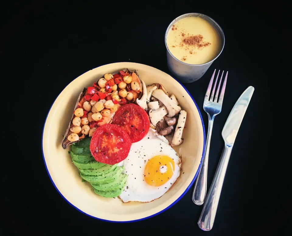 Sunday brunch - Baked sweet potato with chickpea-pepper stirfry, sautéed mushrooms, roasted tomato, avocado & 🍳 + cup of spiced goldenmilk|coxiella24さん