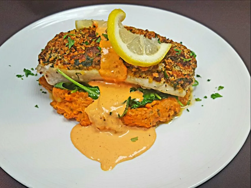 shrimp and chorizo stuffed mahi mahi...with parsley paprika mashed potatoes,quilted spinach and finished with a roasted pepper cream sauce|chef Charlesさん