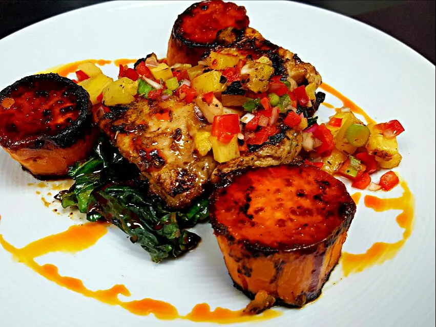 Snapdishの料理写真:jerk chicken thighs,with grilled pineapple salsa,charred sweet potatoes and swiss chard|chef Charlesさん