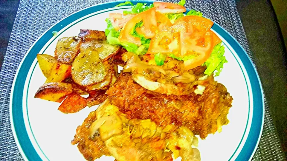 Pork n Veggie Stuffed in Rosemary Mushroom Pork Chops Roasted Garlic Potatoes and a Side Salad.|Juan Simmsさん