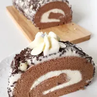 Snapdishの料理写真:Old chocolate swissroll coated with chocolate rice and white chocolate chips