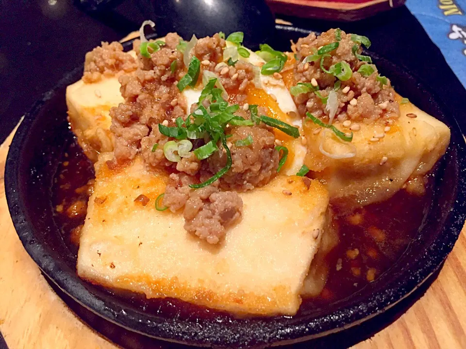 Sizzling tofu with half boiled egg|Sky Blueさん