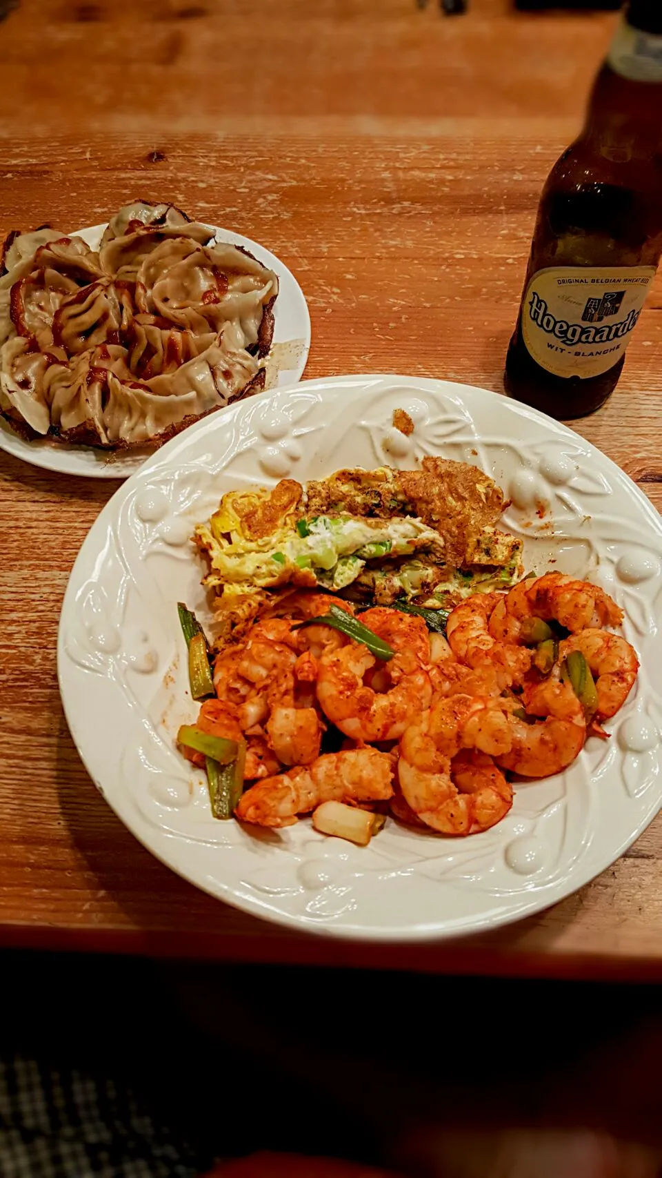 Snapdishの料理写真:It's dinner w leftovers.  Sauté Argentina 🇦🇷 shrimp w green onion, omlette w green onion,  and homemade potsticker. With Hoegaarden beer 🍻|Alonsealさん