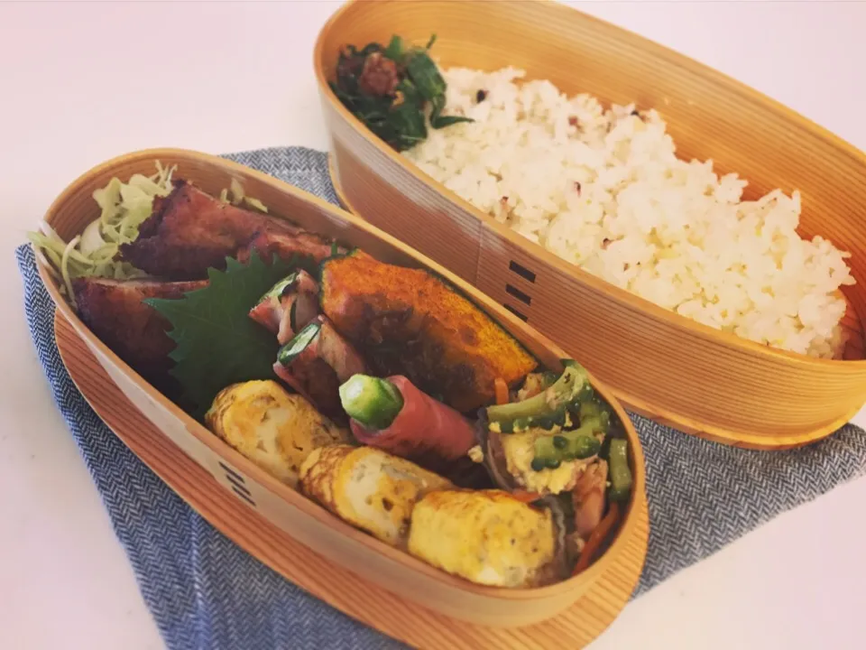 Snapdishの料理写真:今日のお弁当。ひとくちトンカツ、オクラのベーコン巻き、じゃこ入り卵焼き、ゴーヤチャンプル、揚げかぼちゃのシナモンシュガー風味、ゴーヤの佃煮、モロヘイヤ。|Junさん