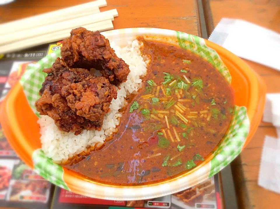 激辛グルメ祭り エチオピア タンドリーフライドチキンとカルピスバターライスのカレー|Takeshi  Nagakiさん