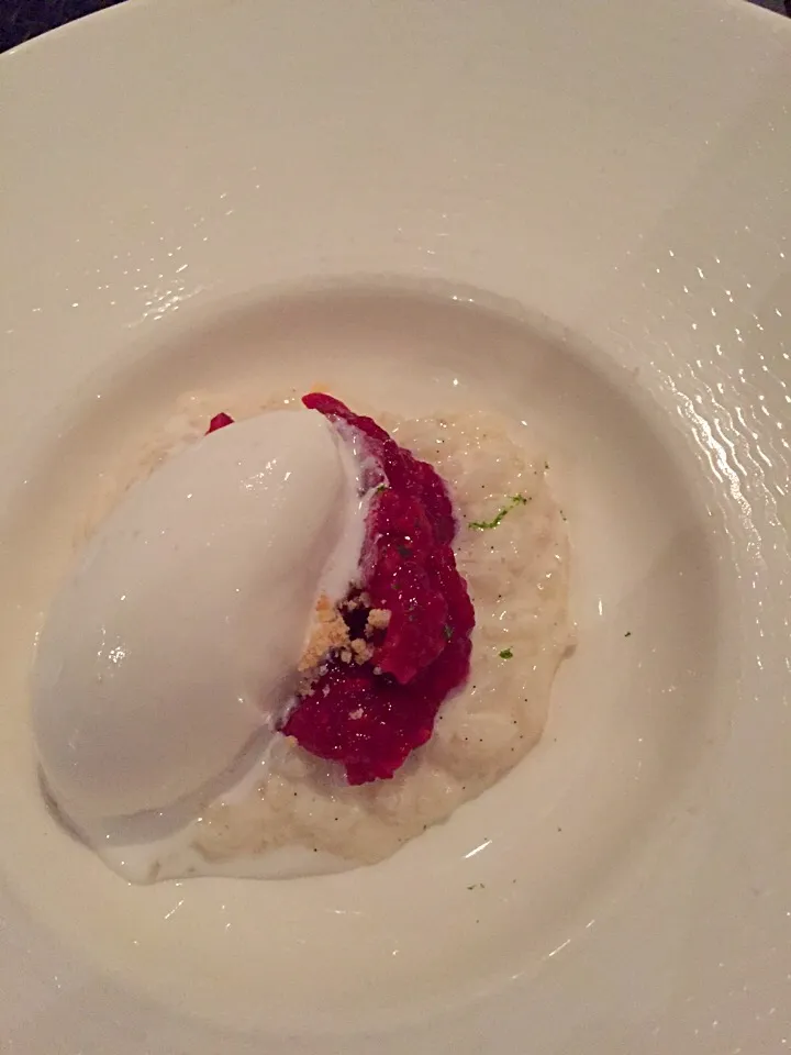 Snapdishの料理写真:Dessert - risotto cooked with milk and served with coconut ice cream , what a creation! It's so yum! Salute to the French chef 😍😍. rasberry sauce is on point|sarahさん