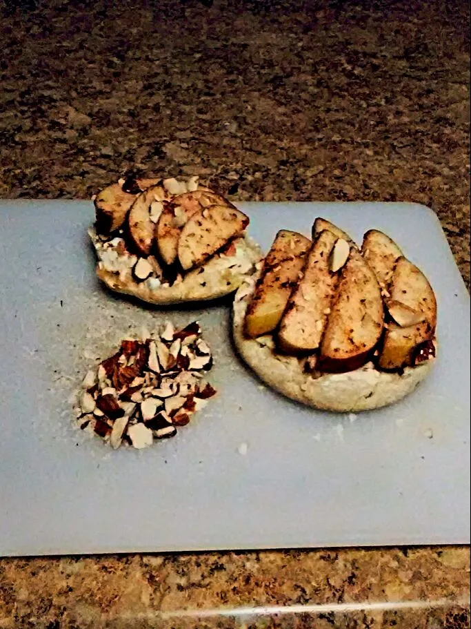 Snapdishの料理写真:Toasted English Muffins with Brie and Cheddar Spread, Chopped Toasted Almonds, and Spiced Apple Slices. Finished with a Drizzle of Maple Syrup and Chopped Toast|bethさん