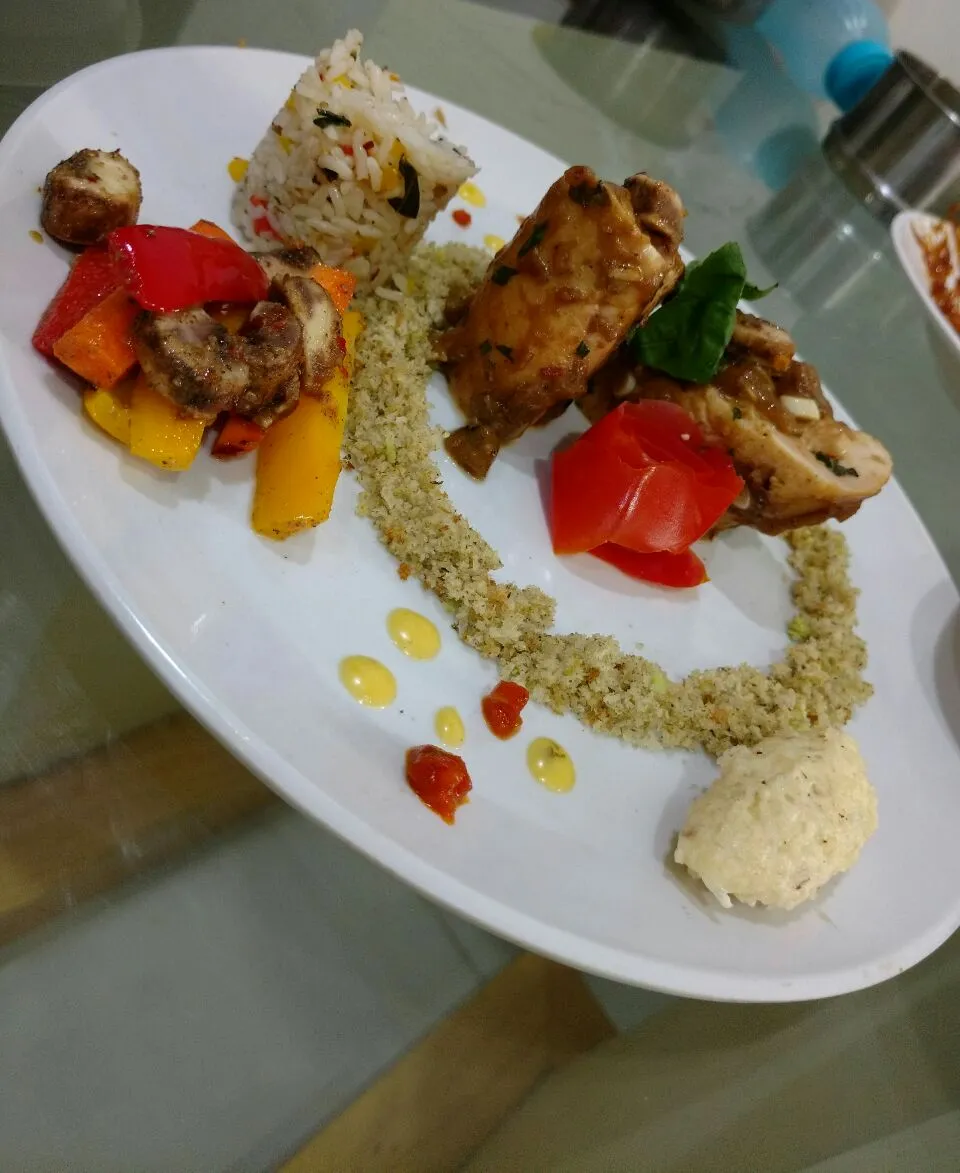 stuffed chicken with herb rice pilaf.|Venkatesh Sharmaさん