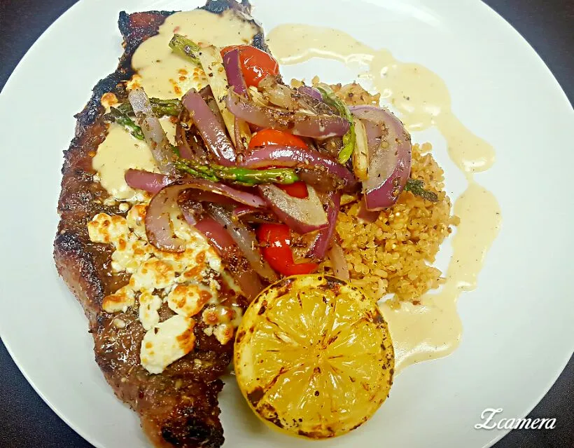 Greek style marinated strip with tomato basil quinoa Mediterranean veggie blend and a feta cheese fondue saucw..|chef Charlesさん