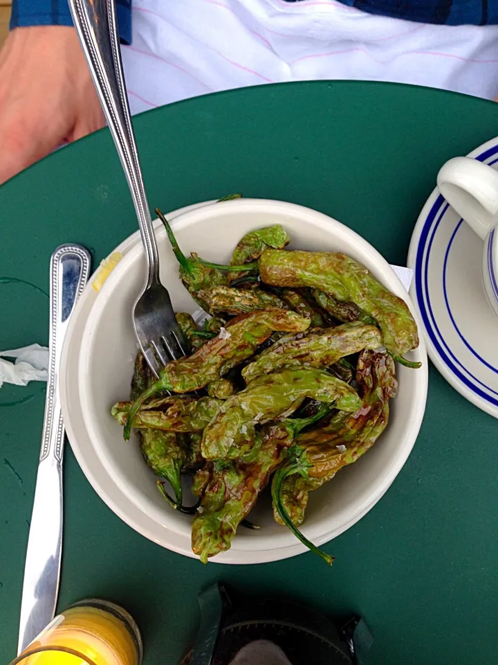 Snapdishの料理写真:blistered shishito peppers, lemon, salt|Ryderさん