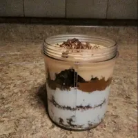 Snapdishの料理写真:Breakfast Parfait with Maple and Pumpkin Yogurts, Coconut Mocha Granola, Maple Quinoa Crumbles, Spicy Pumpkin Purée, and Cacao Nibs.|bethさん