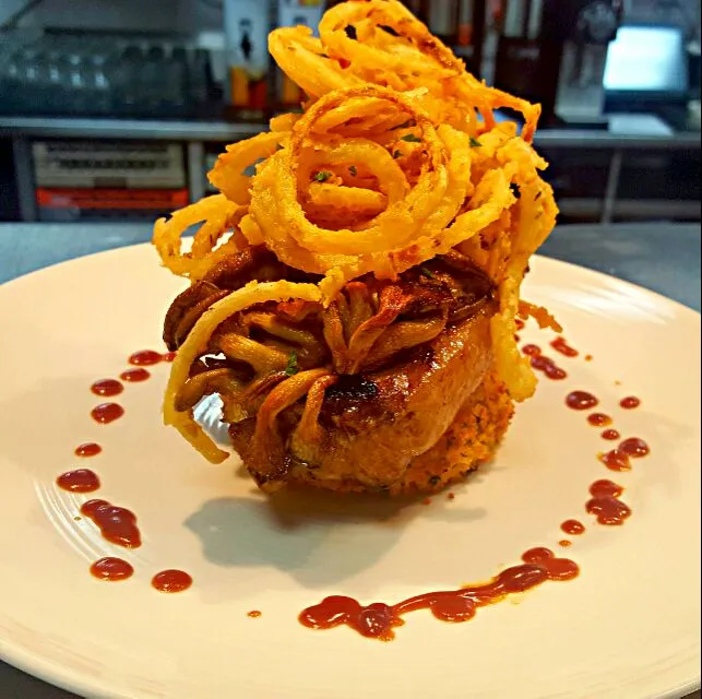 8oz ny strip served over an almond potato cake,topped with a pan seared oyster mushroom and crispy fried oniond,finished with a bbq demi sauce...|chef Charlesさん