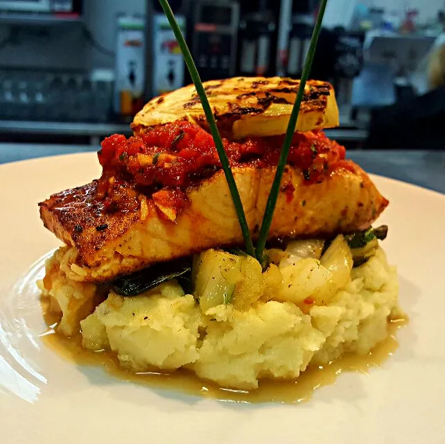 5 spiced grilled salmon over wasabi mashed potatoes and sautéed bok choy ,topped with a roasted red pepper miso ginger romesco and grilled fennel...|chef Charlesさん