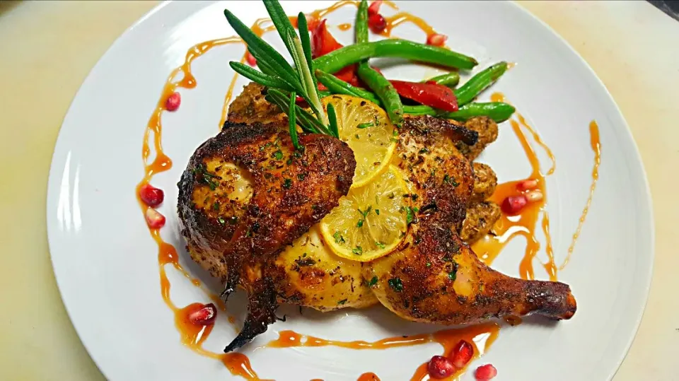 Cornish Game Hen,served over garlic herb roasted fingerling potatoes with vegetable du ju or and finished with a pomegranate gastric..|chef Charlesさん