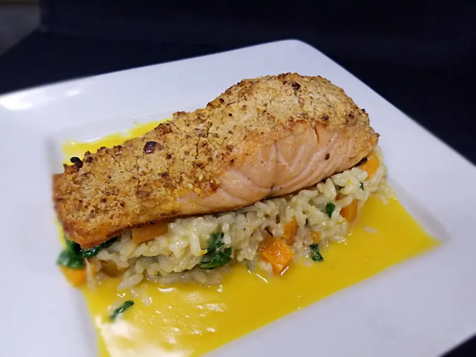 Pecan Crusted Salmon: served atop a butternut squash risotto with spinach and a maple bourbon butter.|Melissa Greenさん