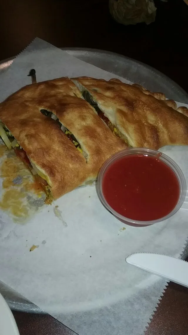 my delicious calzone from work.|Polly Gelfusoさん