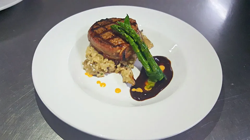 filet mignon tuscan style with a red wine demi juxlee croquettes of poached asparagus and a red pepper cream|Jayson Mccrimmonさん