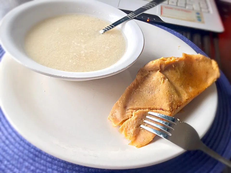 Moimoi (also known as beans cake) and water soaked garri (a kind of native cereal or starch made from cassava/tapioca) (Nigerian meal)|Nancy Emenalomさん