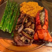 Snapdishの料理写真:Ribeye steak with sautéed mushrooms, lobster tail, asparagus and mashed sweet potatoes|ThaVirgo86さん