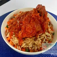 Rice and beans with beef stew (Nigerian delicacy)|Nancy Emenalomさん