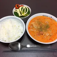 Snapdishの料理写真:鳥ももの豆乳トマト煮込み|わいわいさん