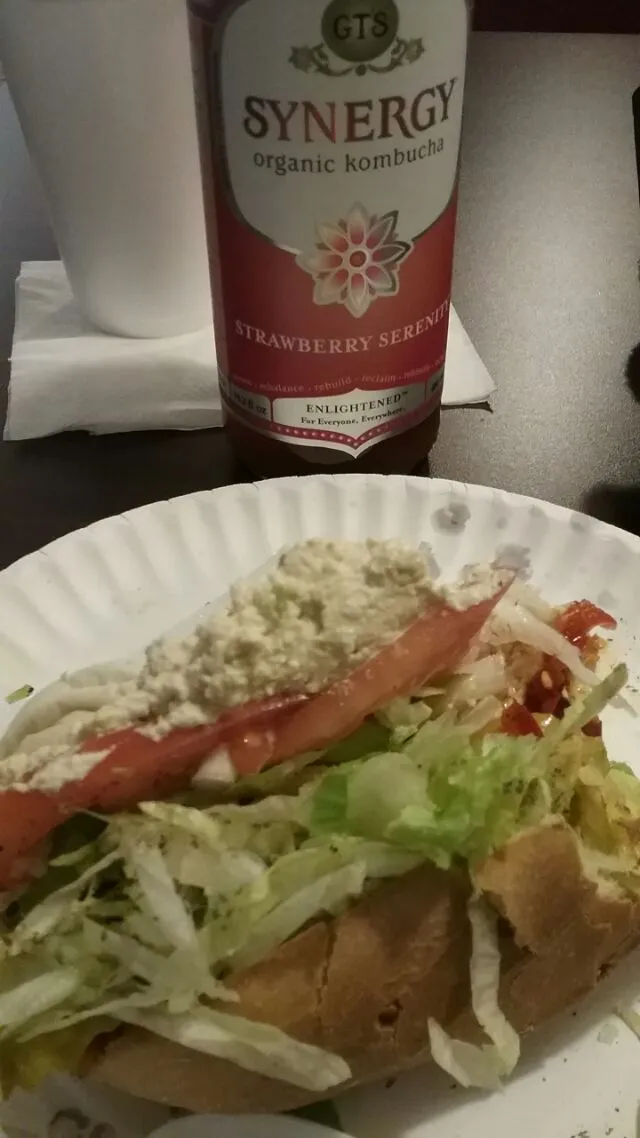 Snapdishの料理写真:my, meatless italian grinder with tofu salad and kombucha.|Polly Gelfusoさん