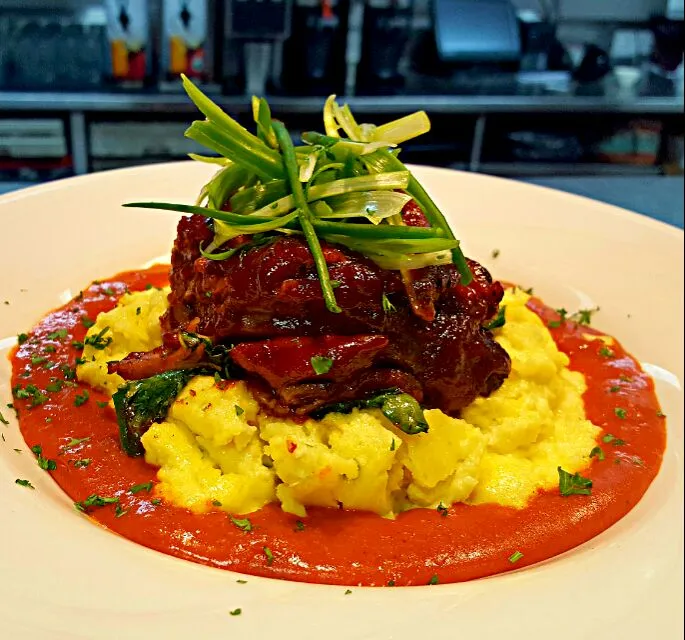 Smoked Brisket over Parmesean and Jalepeno Polenta with sautéed Rainbow Chard and a Roasted Red Pepper Coulis.....|chef Charlesさん