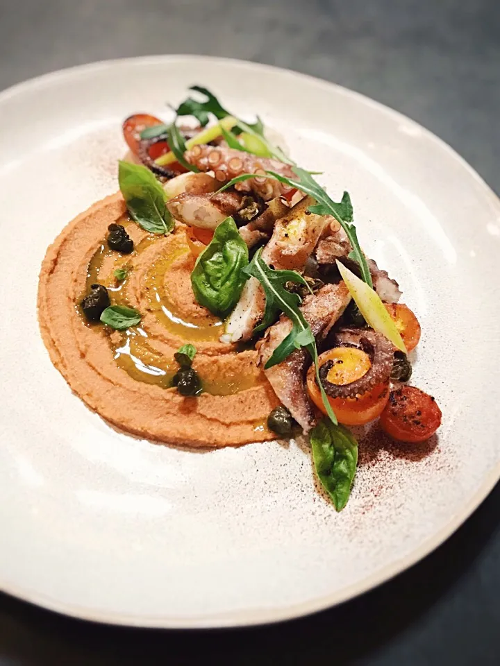 Grilled octopus with roasted tomato chickpea purée,pickled celery,crispy capers and basil|rick chanさん