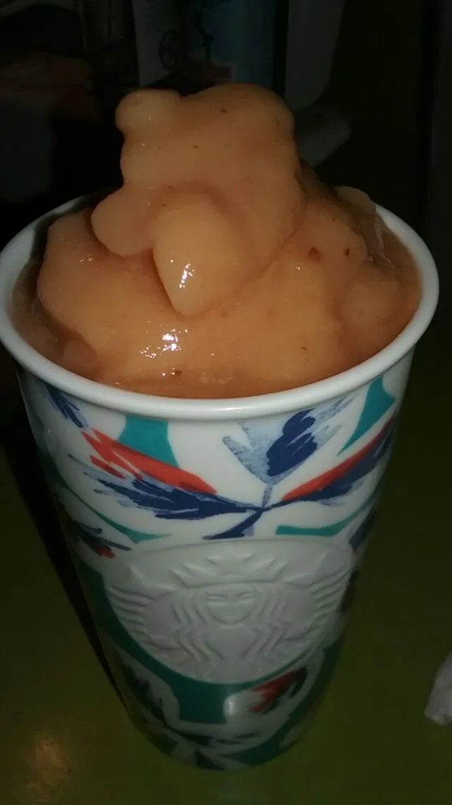 Snapdishの料理写真:frozen peaches,  cherries,  and pineapple blended with Tropicana probiotic peach passion fruit juice.|Polly Gelfusoさん