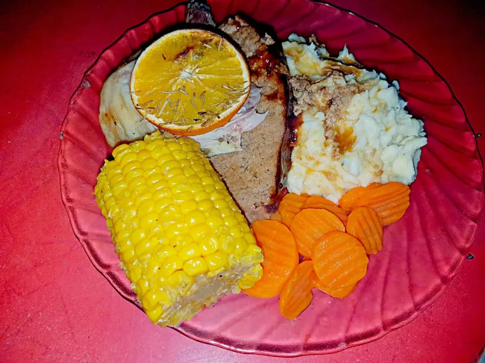 Snapdishの料理写真:Two Meat Meatloaf, Orange Chicken, Creamy Mashed Potatoes Steamed Carrots and Buttered Sweet Corn on the Cob.|Juan Simmsさん