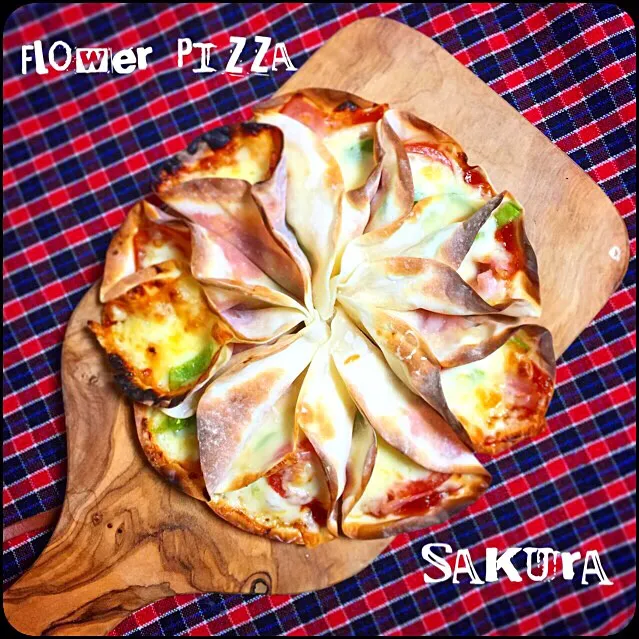 フラワーピザ🍕❁❀✿✾|さくちんさん