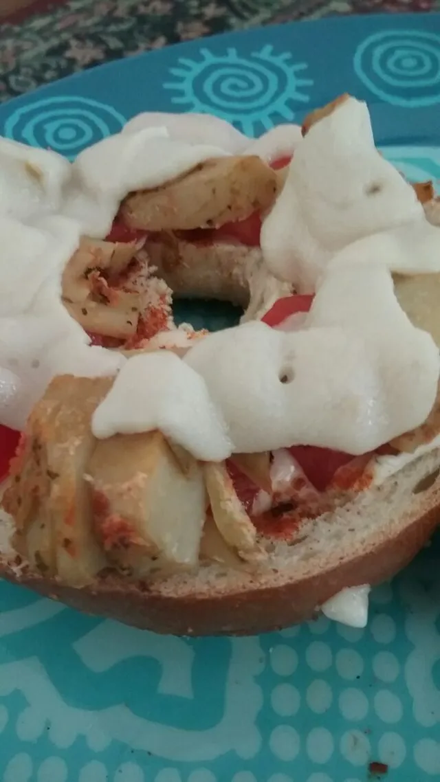 cinnamon sugar bagel with grilled artichokes, tomato,  mayo, crm chz, mozz chz.|Polly Gelfusoさん