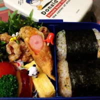 Snapdishの料理写真:新学年初🎶
小2息子のお弁当💕

＃お弁当#おにぎり弁当 #塩唐揚げ #卵焼き#さつまいものレモン煮 #ソーセージを餃子の皮で巻いて揚げてみた|Tsukiさん