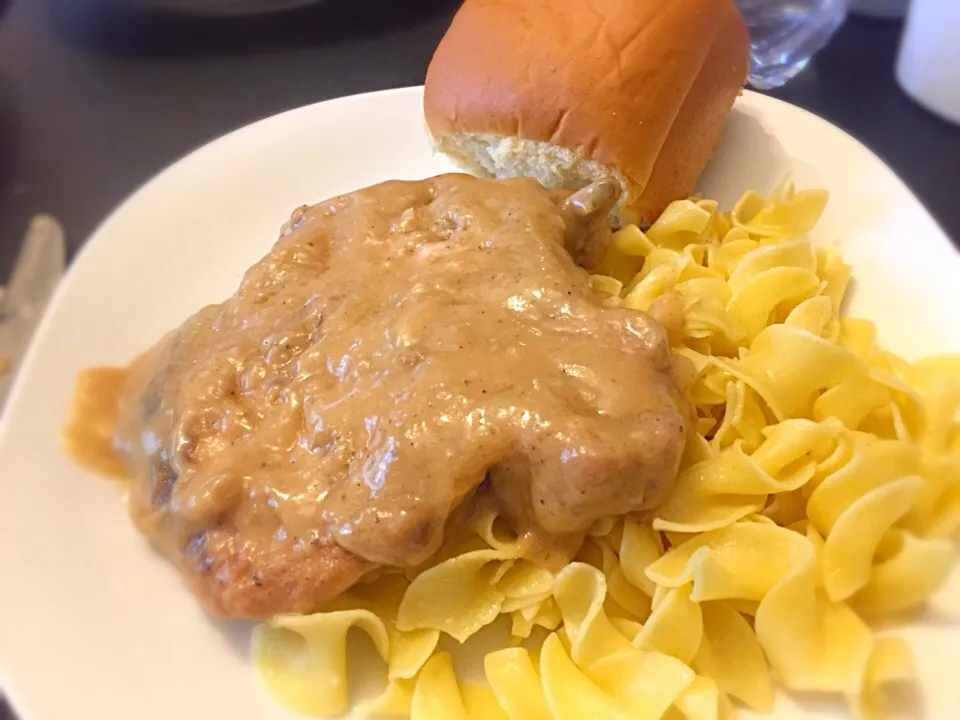 Smothered pork chops over buttered noodles|TJ McAfoosさん