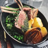 Rack of lamb with herb crust,pea and lettuce,green bean...