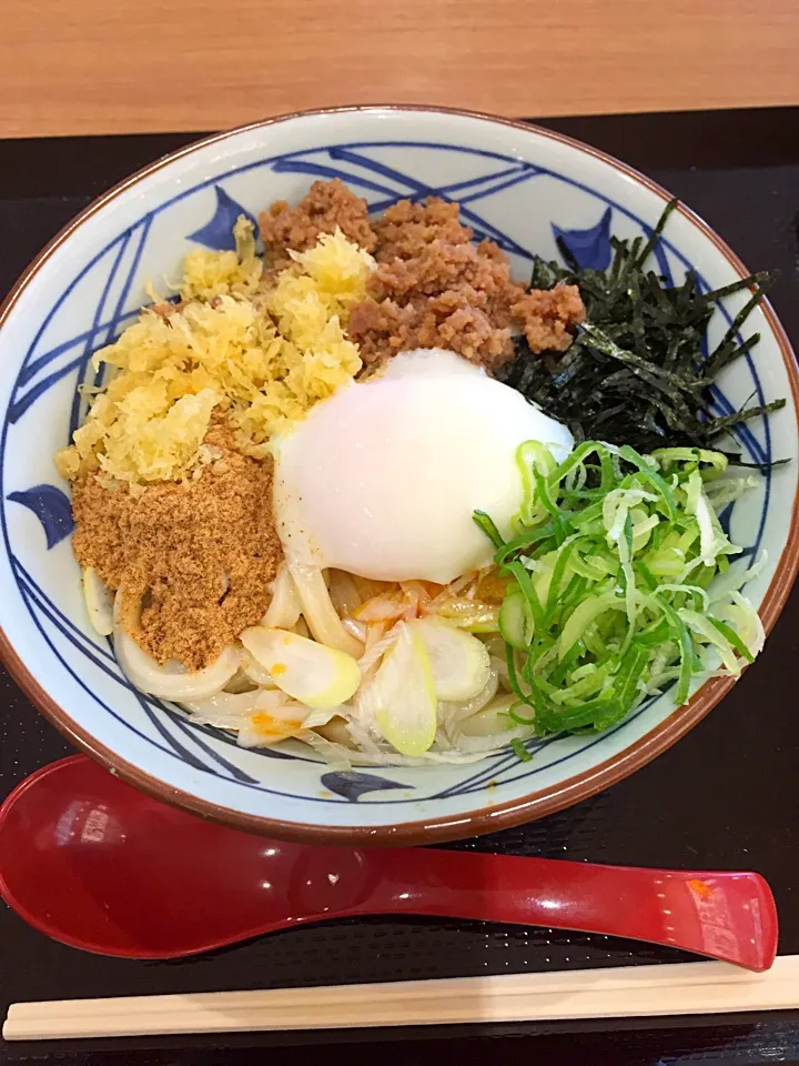 Snapdishの料理写真:旨辛釜玉うどん@丸亀製麺|Kazuya Miyukiさん