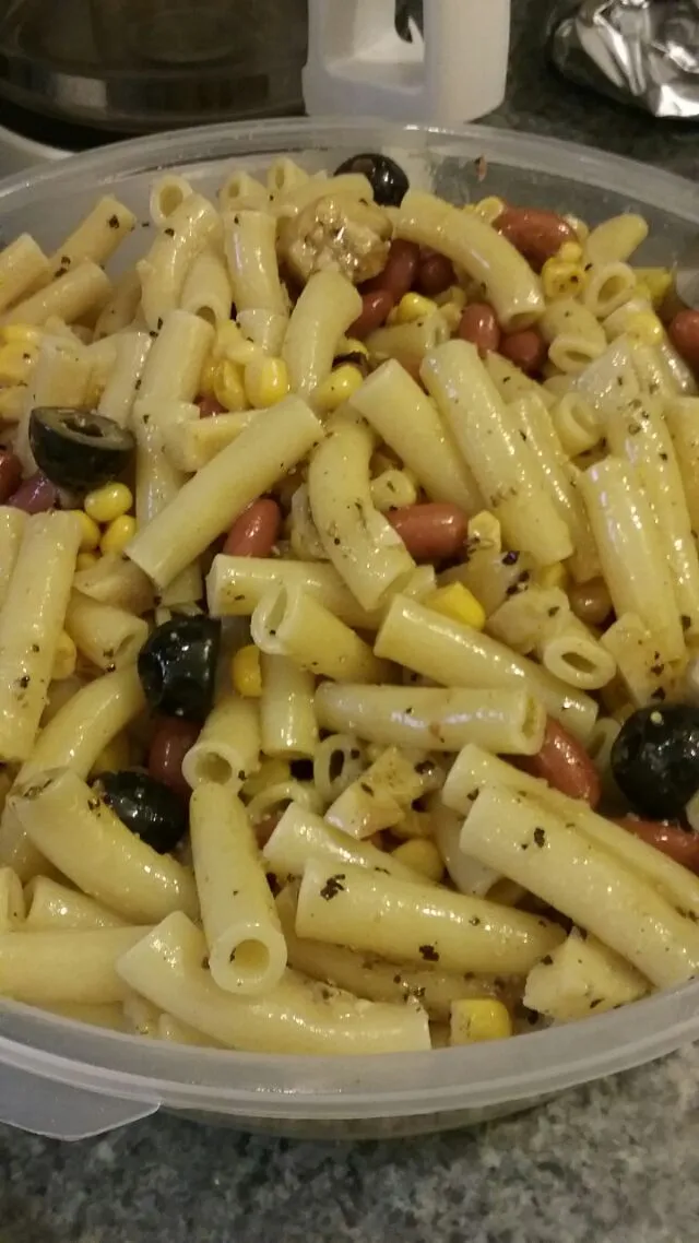 Snapdishの料理写真:pasta salad.  french inspired spice vinaigrette with olives, artichokes, corn, and red kidney beans.|Polly Gelfusoさん