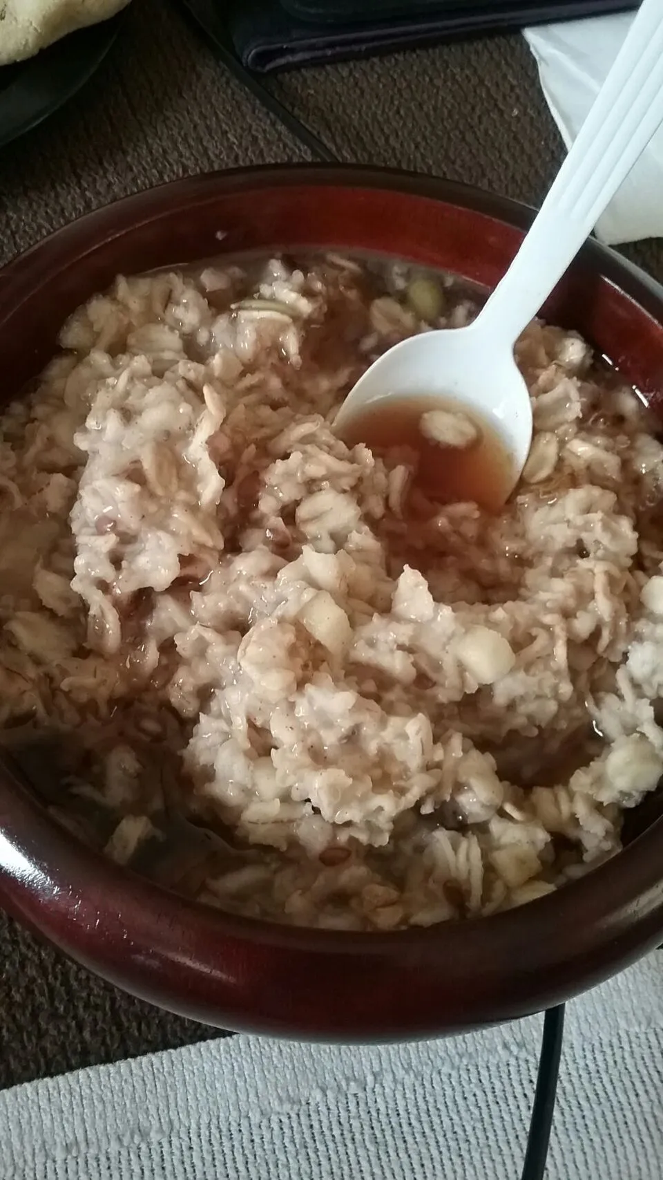 apple cinnamon oatmeal suped up with butter and maple syrup.|Polly Gelfusoさん