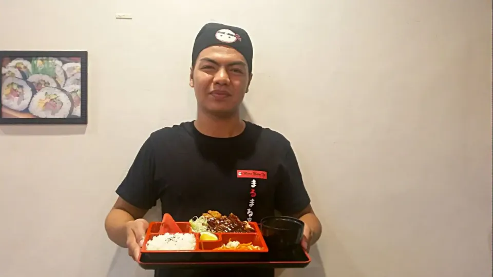 man with tonkatsu bento #1|marilou araiさん