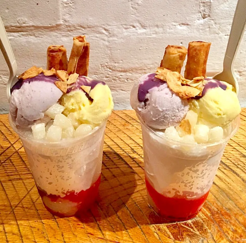 Halo~Halo( tall ice shaved cup with exotic fruits and beans in the bottom topped with purple and mango ice cream and banana eggroll ) #halohalo|🌺IAnneさん