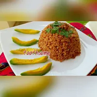 Brown oilless jellof rice with mincedmeat and avocado|Joy Onyinyechi Ekedebeさん