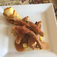 Snapdishの料理写真:Duck with orange sauce on a bed of Stir fry Aubergines and courgettes topped with Bacon wrapped asparagus and served with Sauté potatoes.|Adam Websterさん