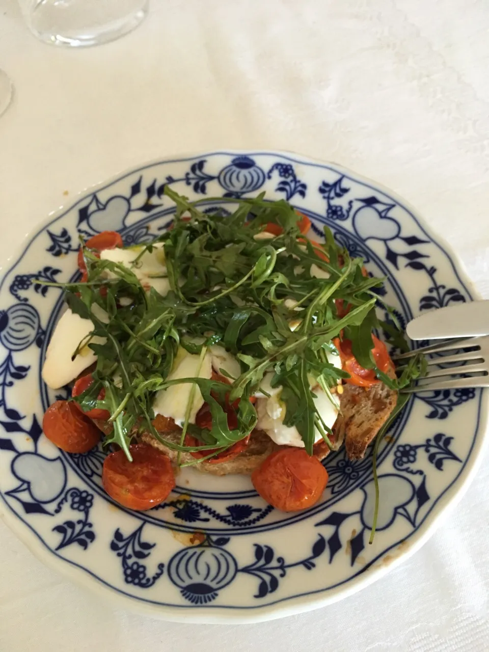 Snapdishの料理写真:Bruschetta - mozzarella cheese, roquet, tomatoes, balsamic vinegar.|monica domeniconiさん