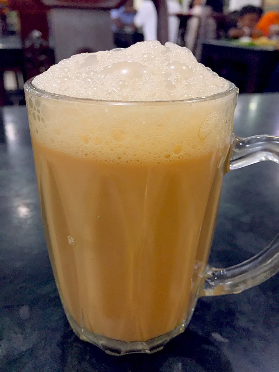 Snapdishの料理写真:Teh tarik, or pull tea. Only in Malaysia...|Amy Aliyyaさん