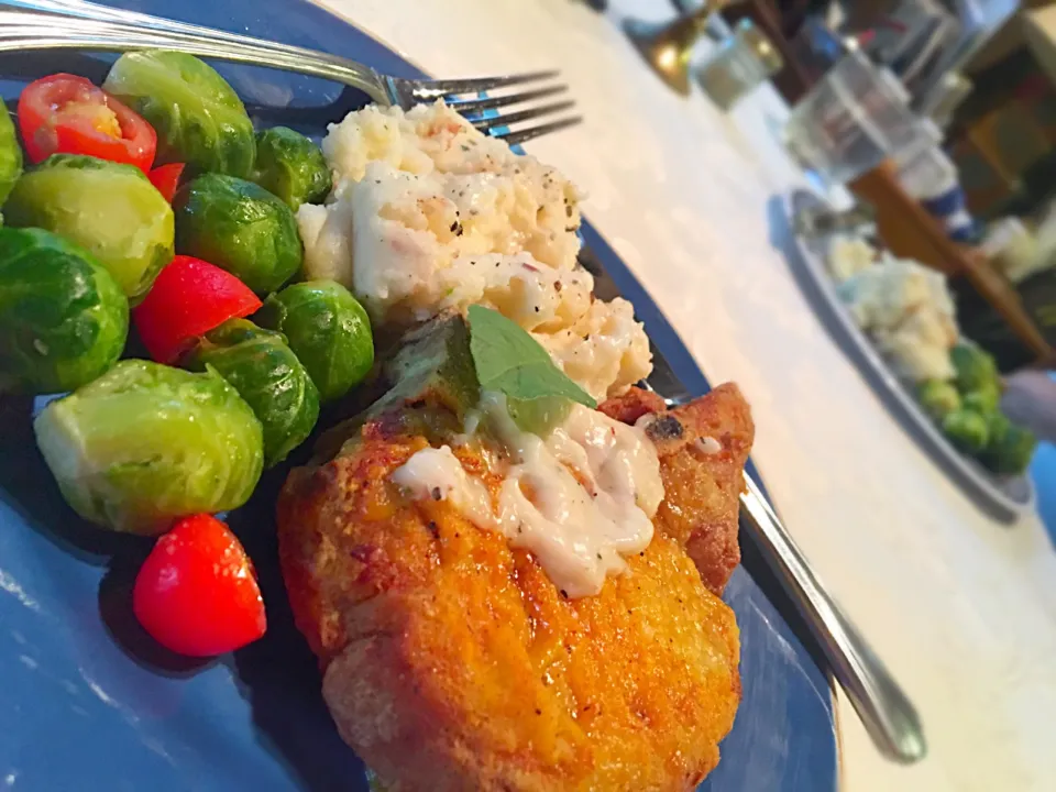 Air fried breaded pork chops with mashed potatoes and country gravy and Brussels sprouts & homegrown tomatoes.|MJRoperさん