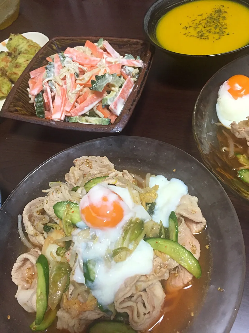 Snapdishの料理写真:7月27日晩ご飯。豚しゃぶキムチ温玉載せサラダ、ゴーヤと切り干し大根マヨ和え、かぼちゃ冷製ポタージュ。|あやさん